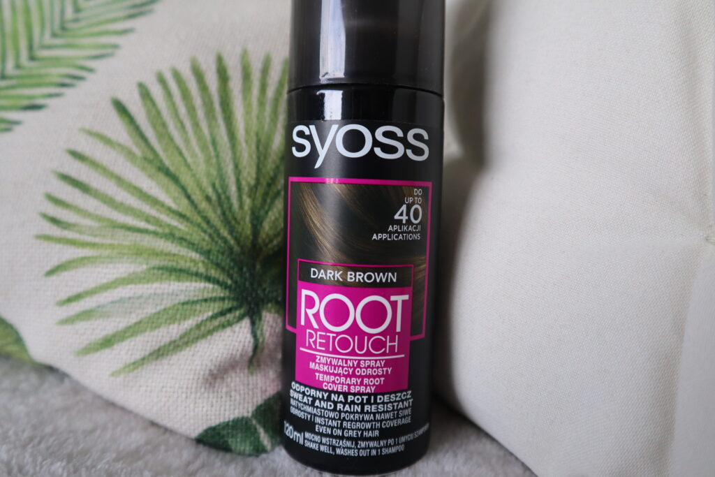 Syoss Root Retouch zmywalny spray do odrostów ciemny brąz na tle poduszek